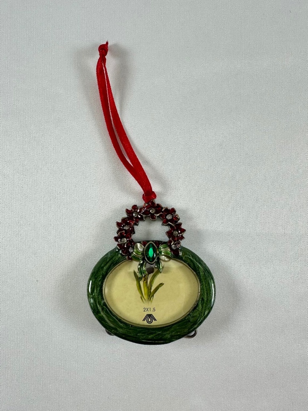 Enamel Red Poinsettia Wreath Christmas Ornament With Green Stone on Bow Frame